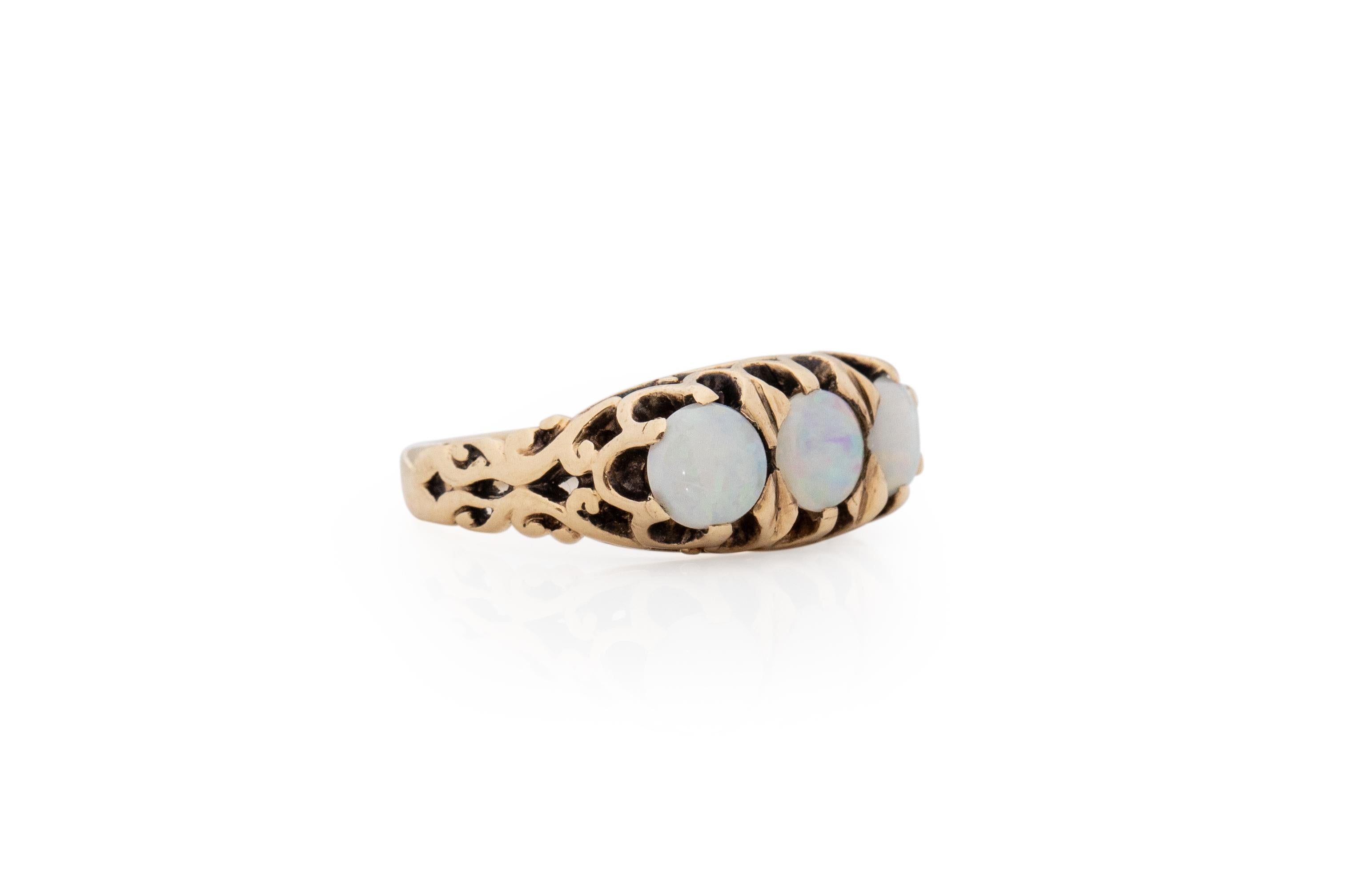 Ring Size: 5.25
Metal Type: 14 karat Yellow Gold [Hallmarked, and Tested]
Weight: 3.5 grams

Opal Stone Details:
Weight: 3.0 carat total weight
Cut: Antique Cabachon Oval
Color: Mixed Colors

Finger to Top of Stone Measurement: 4mm
Condition: