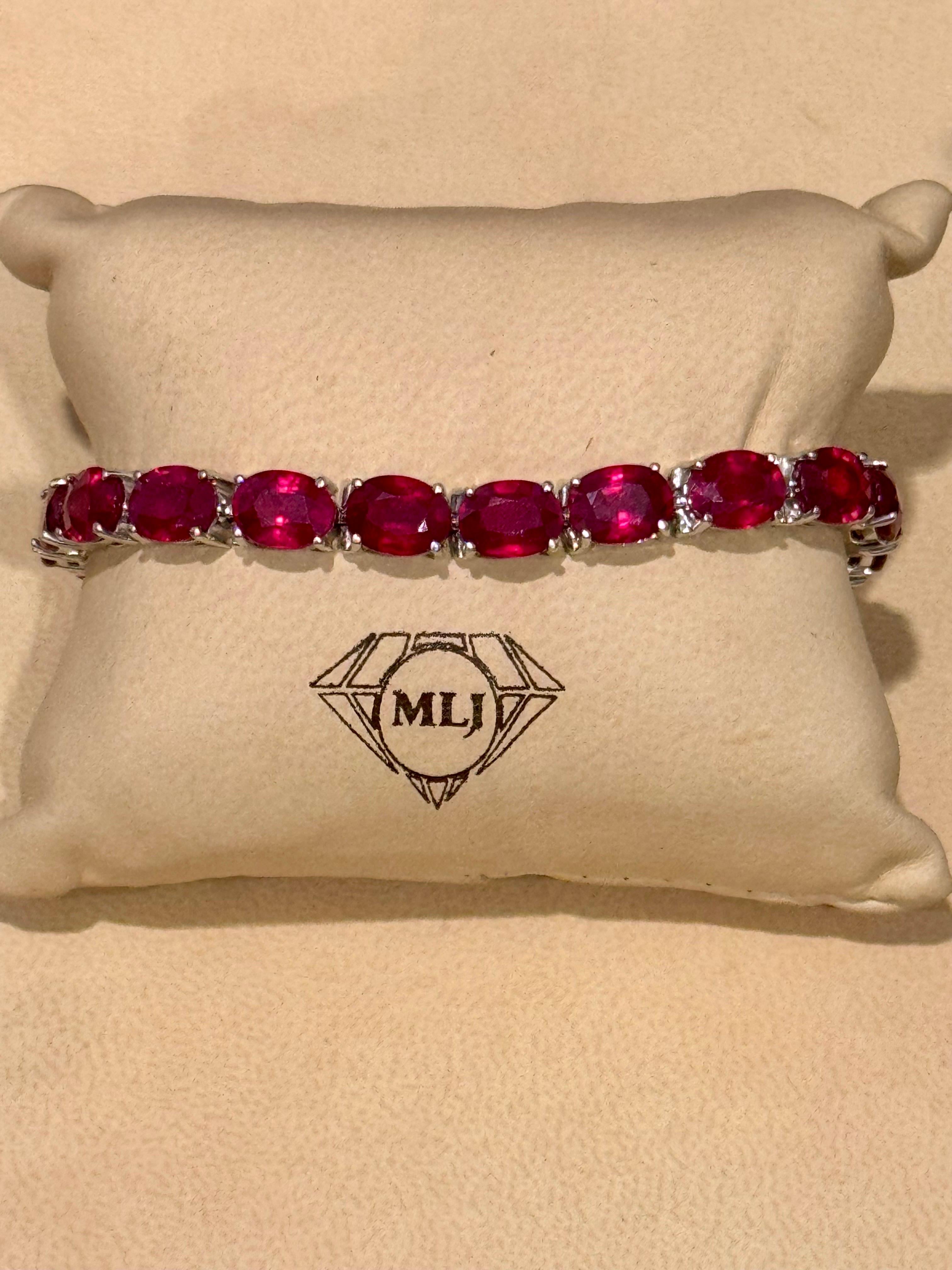 Oval Cut 30 Carat  Treated Ruby Affordable Tennis Bracelet 14 Karat White Gold, 7 