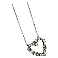 Colgante Corazón Diamante Engastado en Bisel de Oro Blanco de .30 Quilates