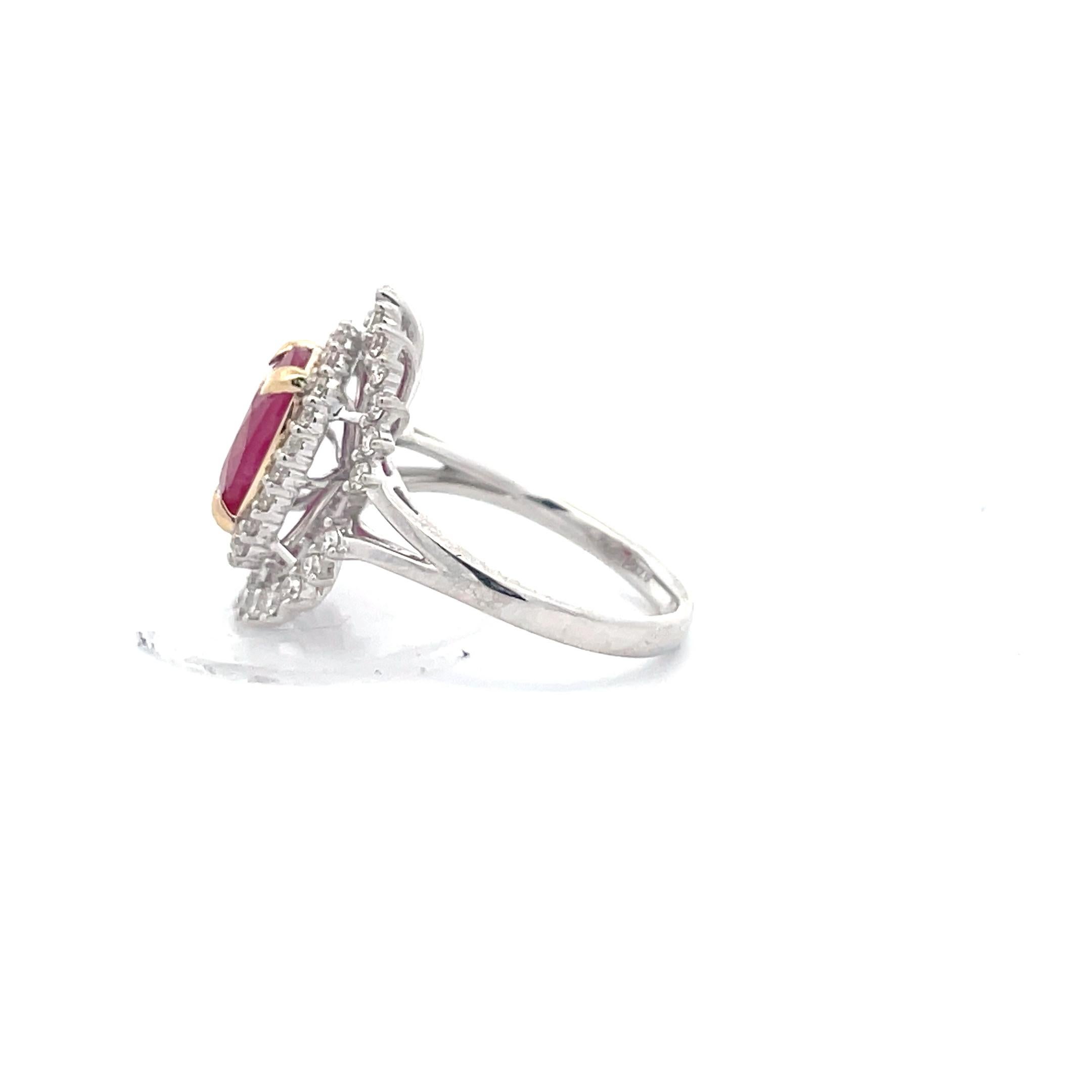 Nothing says love like a ruby ring. With a stunning Oval-cut center stone and diamond halo setting, this 3.0 carat ring is an heirloom piece to be cherished for years to come. Handcrafted by our master artisans, this design combines 14K white gold