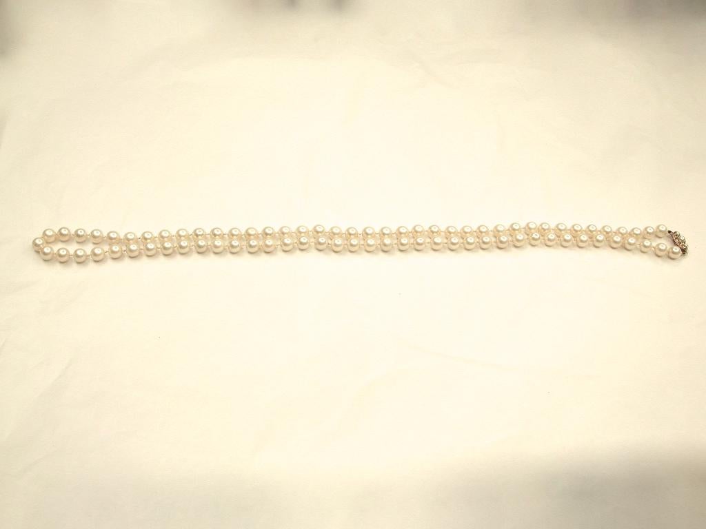 30 Inch Cultered Pearl Necklace with Cultured Pearl 9ct snap, Dated circa 1960.
This lovely necklace is strung with 8 millimetre cultured pearls which are knotted 
throughout.