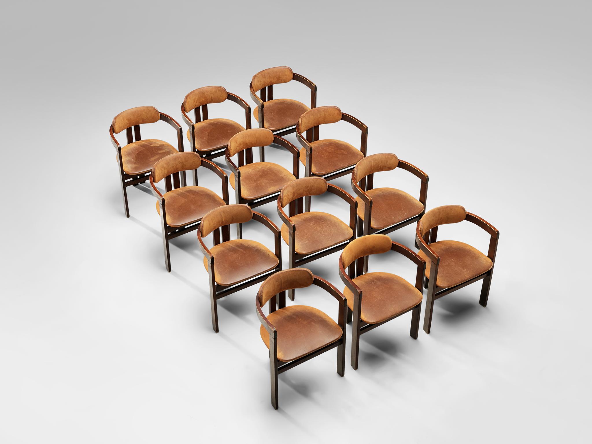 Armchairs, faux-leather and lacquered wood, Italy, 1960s

Armchairs in wood with cognac leatherette. The chairs have a characteristic design, clearly inspired by the Pamplona chair of Augusto Savini. The chairs are functional and straightforward of