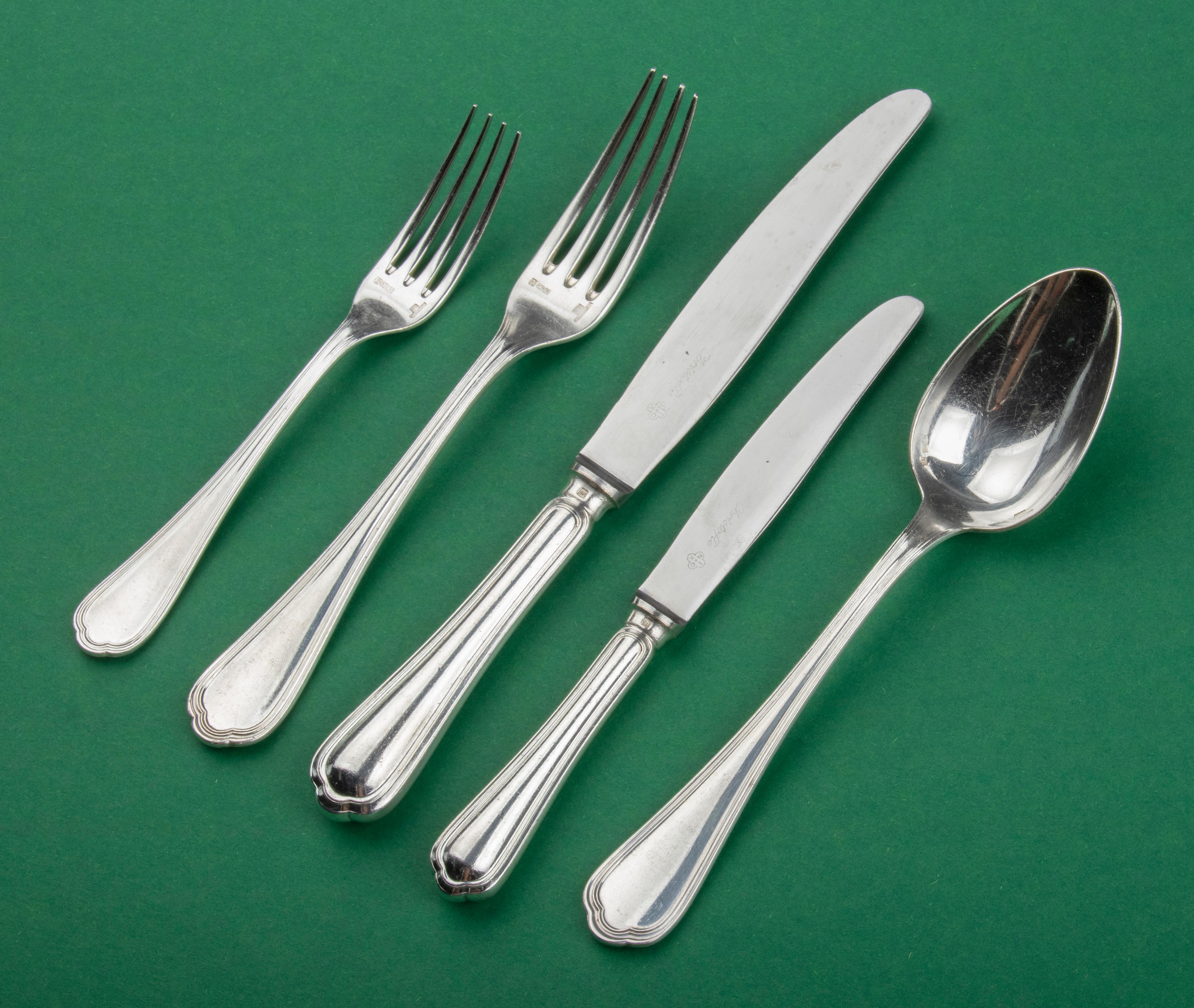 Nice set of silver plated flatware for 6 persons made by the French band Christofle. 
The name of the model is Spatours. De composition of the set is as follows: 6 table knives, 6 table forks, 6 table spoons, 6 lunch knives, 6 lunch knives and 6