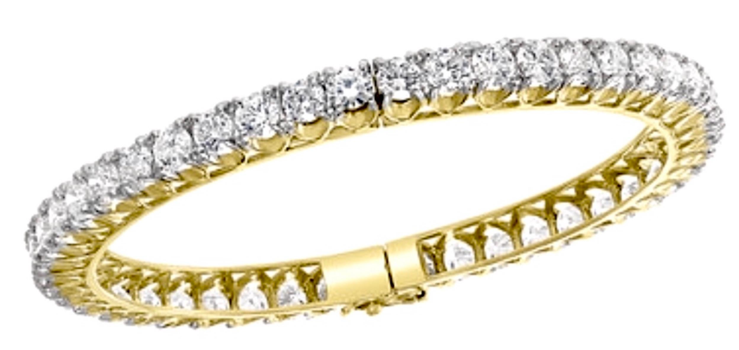 Single line 30 pointer,29 Ct total diamond weight  Contemporary  18 Karat  Yellow  Gold & Diamond  Eternity Bangle Bracelet 
It features Two  bangles  crafted from  18k Yellow gold   embedded with  28.81  Carats of  Round brilliant diamonds in two