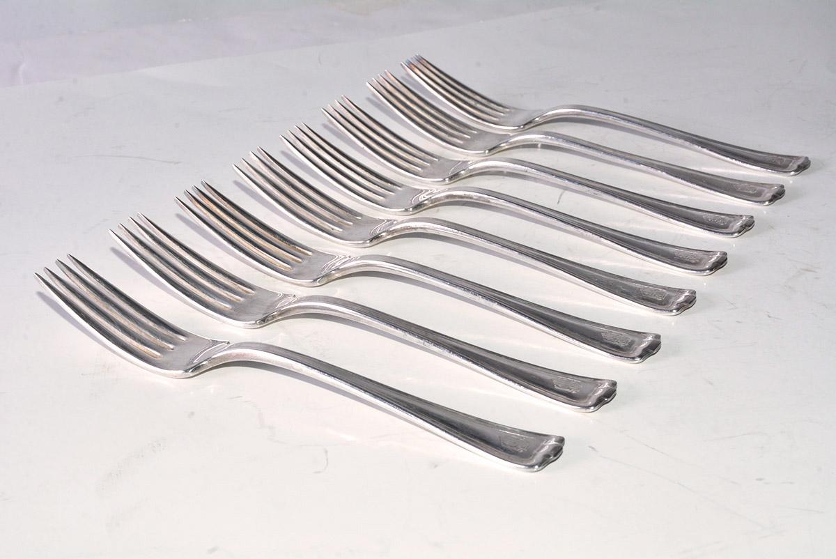 The 30 vintage silverplated salad/luncheon forks are stamped 