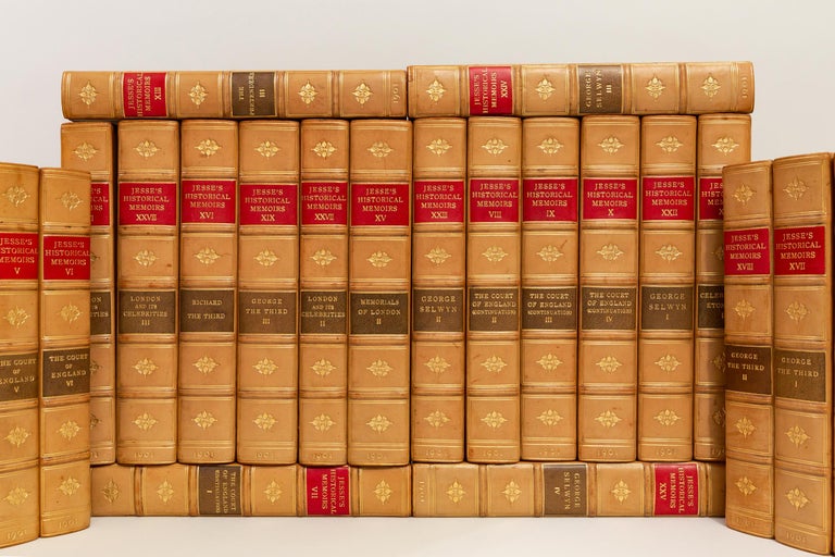 30 Volumes. John Heneage Jesse, Memoirs of The Court of England. Bound in 3/4 tan calf. Linen boards. Raised bands. Decorative gilt symbols on spines. Top edges gilt. Marbled endpapers. Illustrated. Four portraits included. Published: London; John