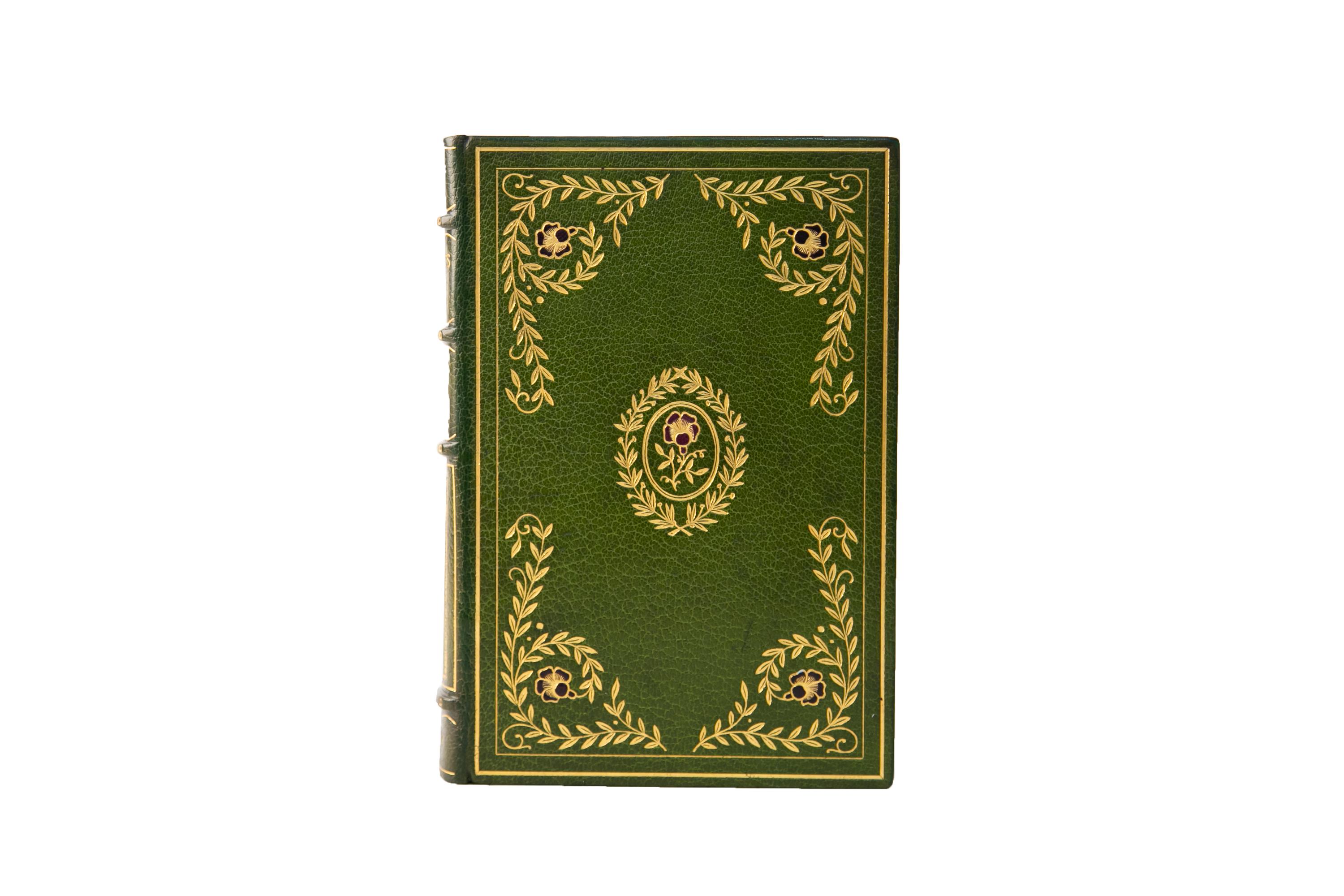 30 Volumes. William M. Thackeray, The Complete Works. Limited Edition. Bound in full green morocco with covers displaying bordering and ornate floral detailing in gilt tooling, red, and brown morocco inlay. Raised bands gilt with panels displaying