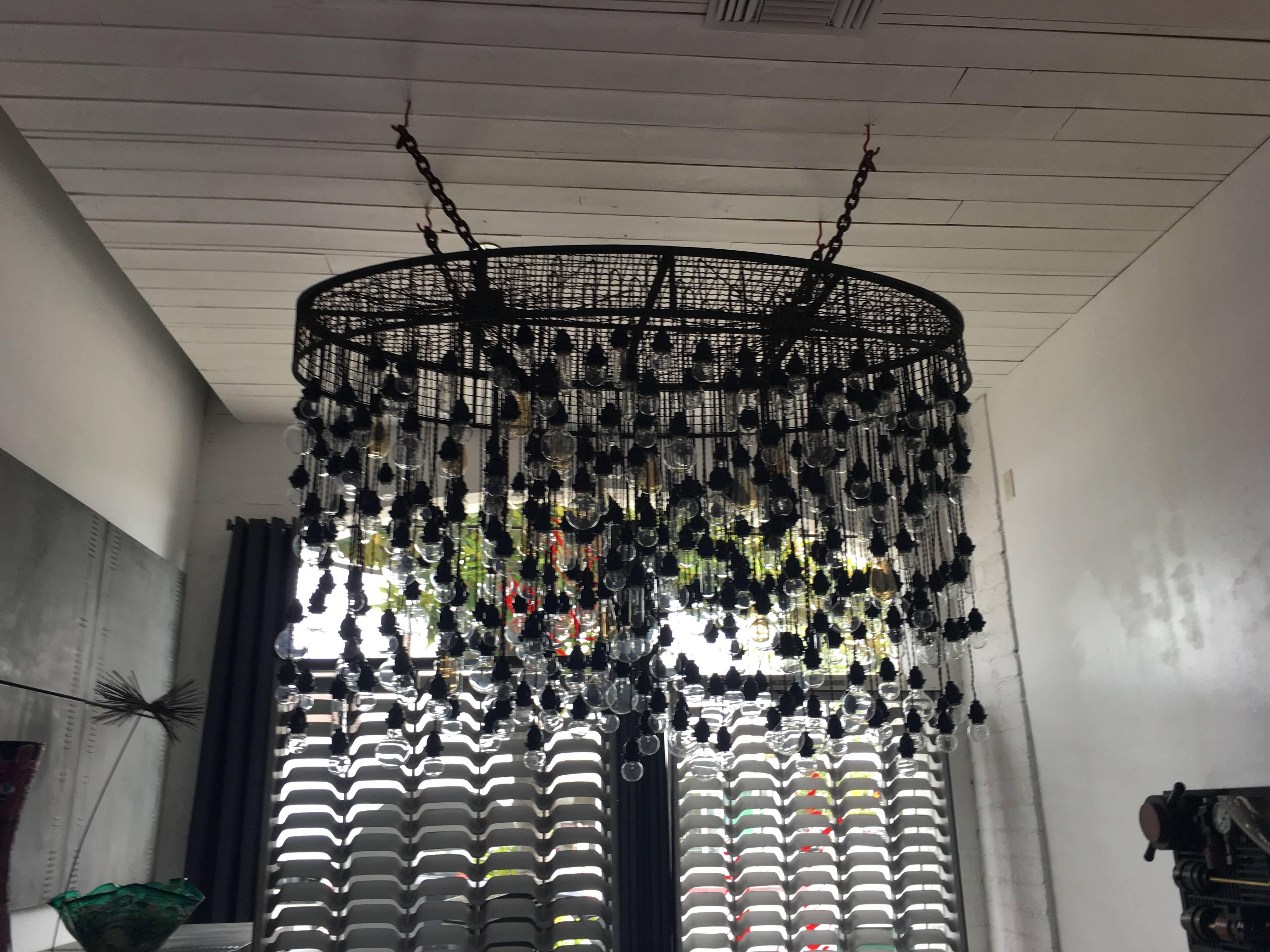 Most unbelievable and breathtaking chandelier. Mixture of functional and decorative light bulbs in oval frame. The hanging chain you see in the picture is temporary, the chandelier can be hung directly onto the ceiling without chain.