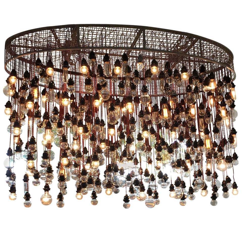 Stunning Conveyor Belt Chandelier With Decorative Drops image