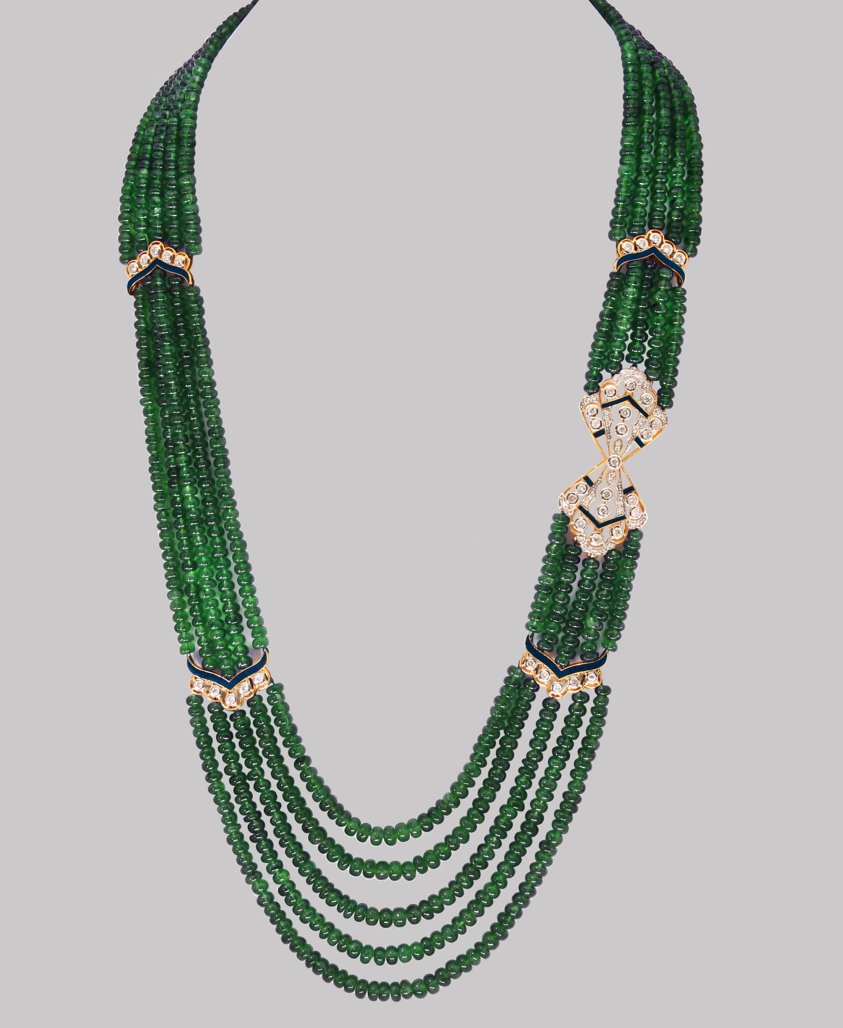 Approximately 300 Carat  very fine Emerald Beads 5 Line Necklace With 14 Karat Yellow Gold Clasp Adjustable with multiple links
This spectacular Necklace   consisting of approximately 300 Ct  of fine beads.
The shine sparkle and brilliance with deep