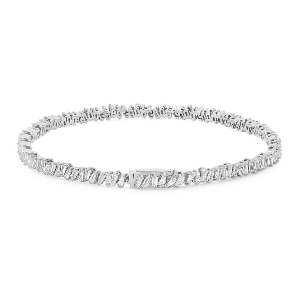 Embrace the exquisite brilliance of the 3.00 Carat Baguette Cut Diamond Tennis Bracelet in 18K White Gold, a masterpiece of goldsmithing. This stunning creation showcases the highest level of craftsmanship, resulting in a truly dynamic piece. The