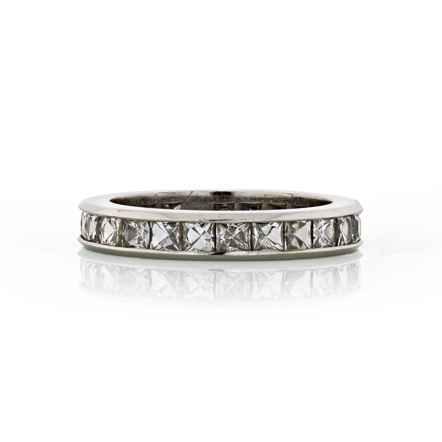 This 3.00 Carat channel set French-Cut diamond platinum eternity band is an estate ring in great condition. Set with french-cut vintage diamonds in a channel setting this ring is a perfect anniversary or a wedding band. 3mm wide it will fit nicely