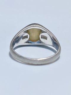 3, 00 Carat Chrysoberyl "Cats-Eye" and Baguette Cut Diamond Platinum Ring