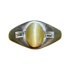 Vintage 3, 00 Carat Chrysoberyl "Cats-Eye" and Baguette Cut Diamond Platinum Ring