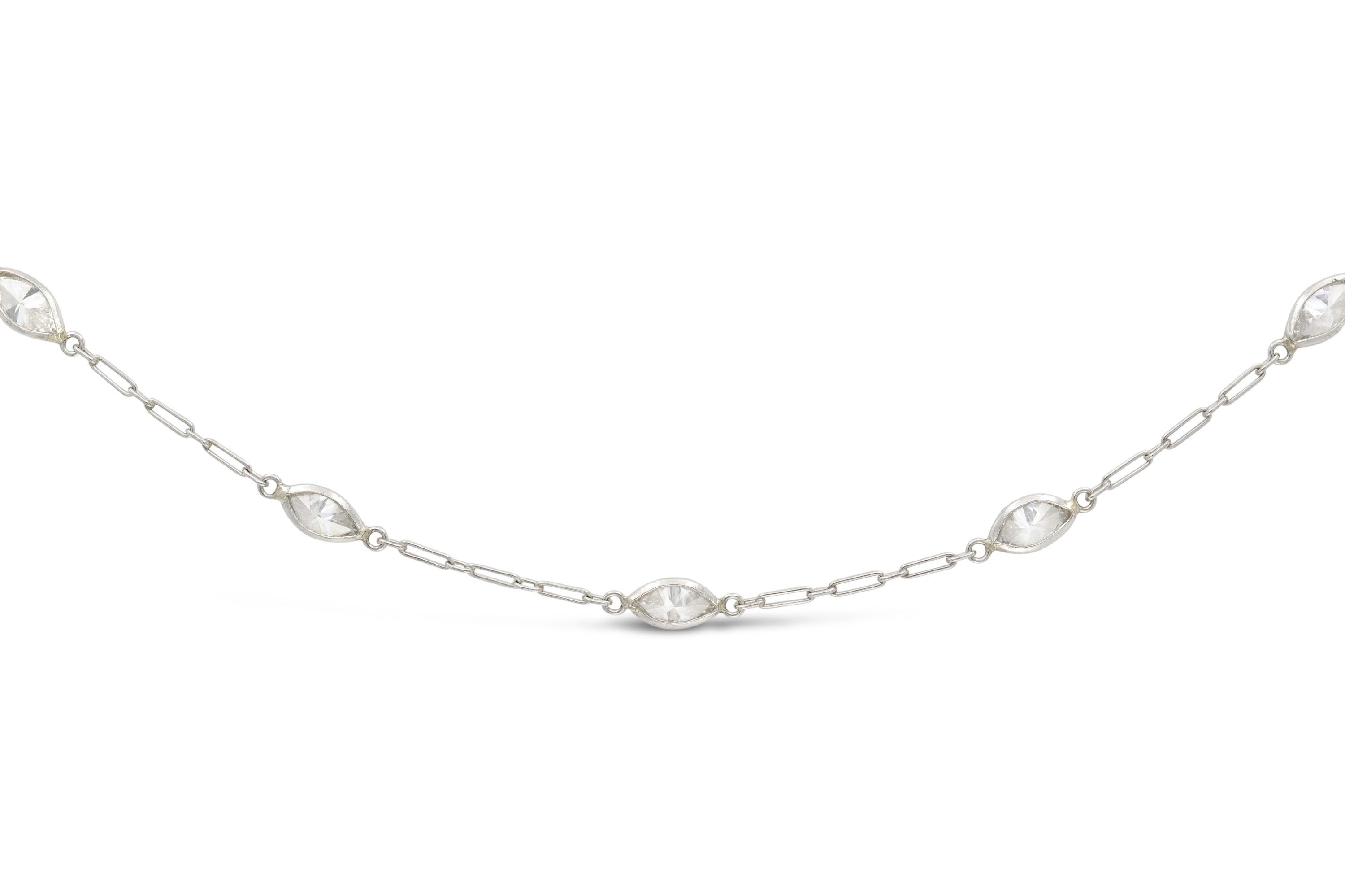Finely crafted in platinum with 17 marquise-cut diamonds weighing a total of approximately 3.00 carats. 
18 1/2 inches. 