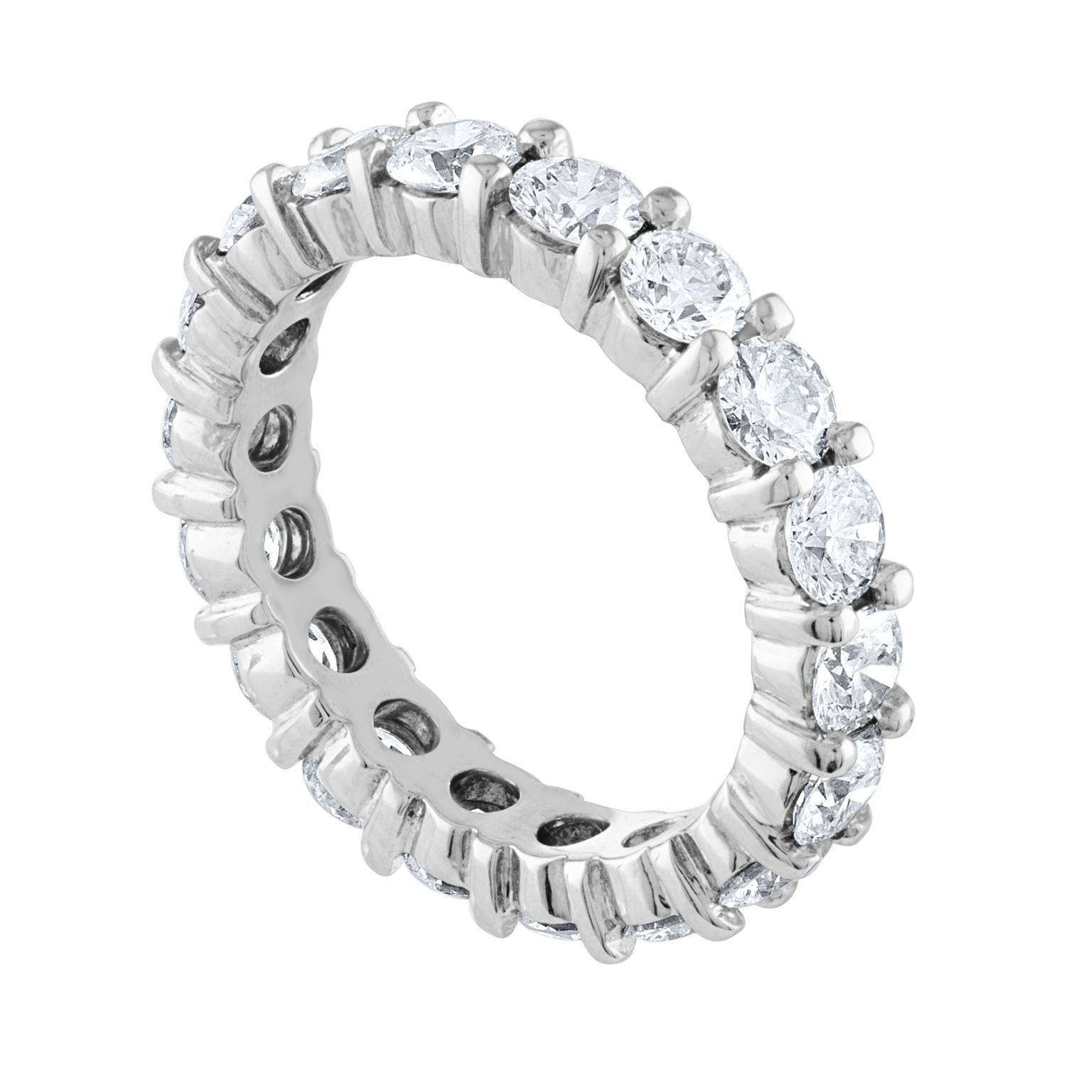 Beautiful Eternity Ring
The ring is 14K White Gold
There are 3.00 Carats In Diamonds F/G VS
The diamonds are round brilliant
The ring weighs 4.2 grams
The ring is a size 5.50, not sizable.