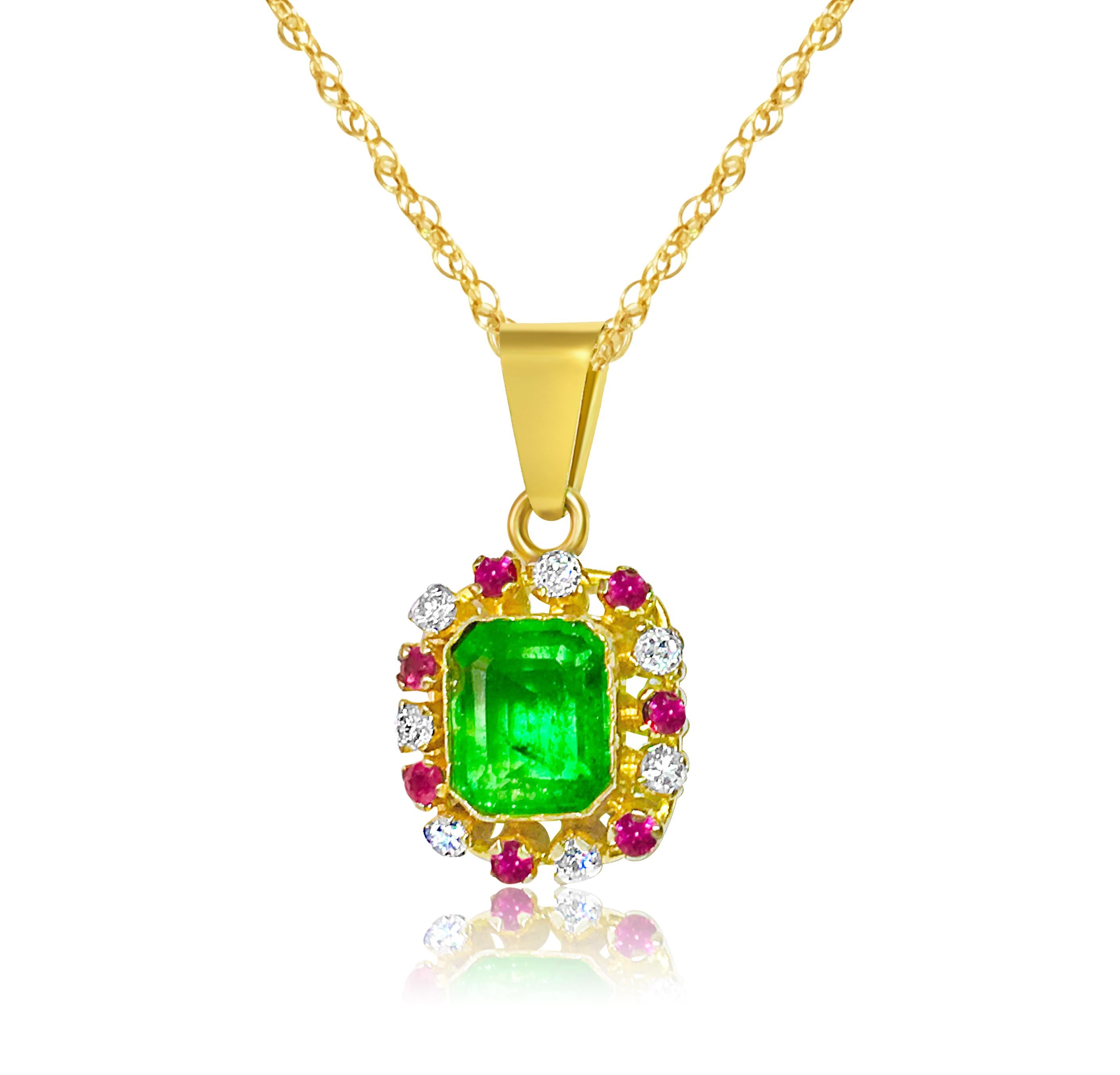 Metal: 18K yellow gold. 
0.20 carat diamonds, SI clarity and G color. Round brilliant cut. 
0.30 carat total Burma ruby. Round shape
2.50 carat emerald. Emerald cut.
TCW of all gemstones 3.00 carats. 
All gemstones are 100% natural earth mined.