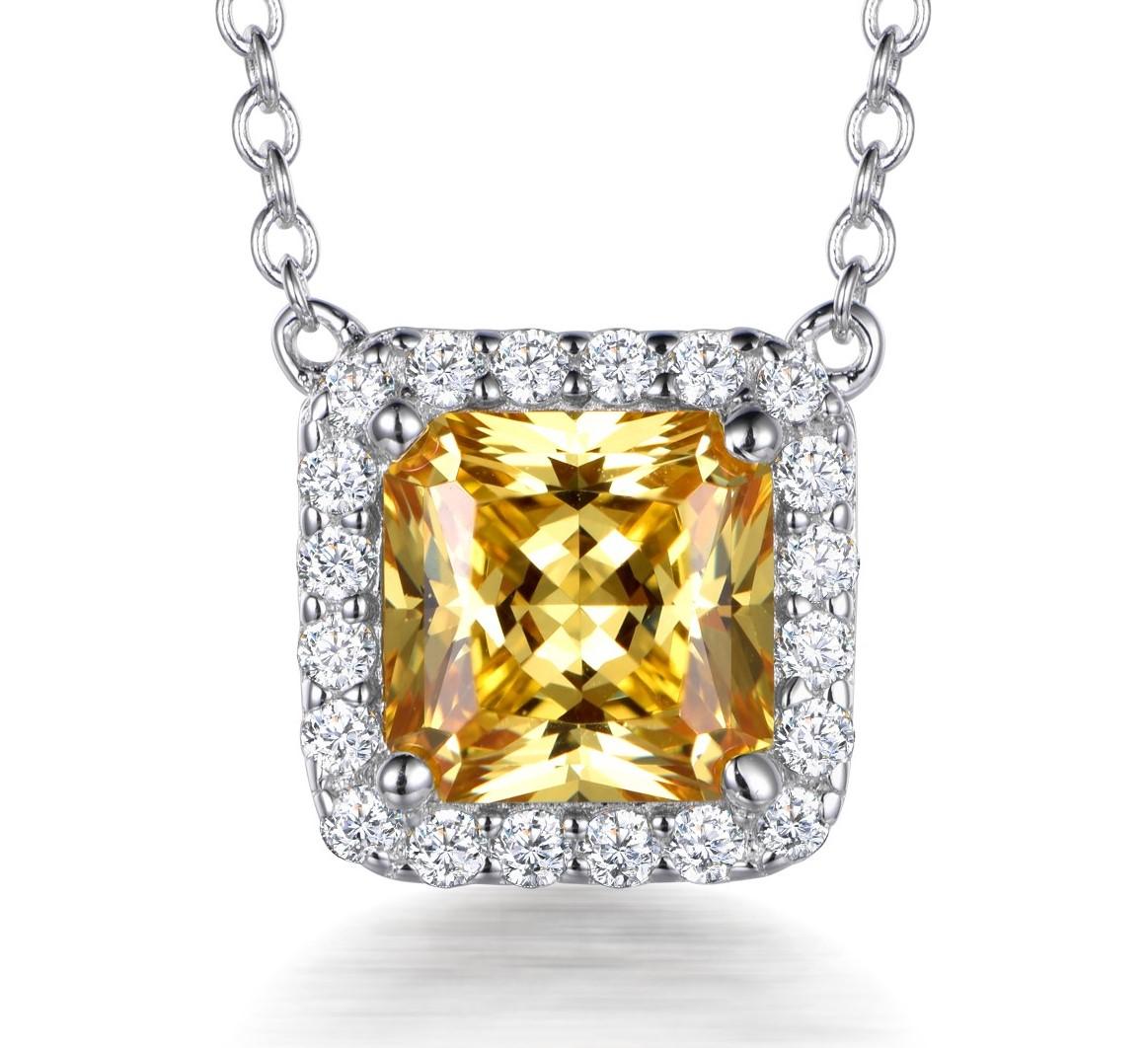Golden honey tones emanate from this stylish 3.00ct yellow asscher cut cubic zirconia surrounded by 20 smaller round brilliant cuts.

Composed of 925 sterling silver with a high gloss white rhodium finish.

Chain measures 16ins with a 2ins