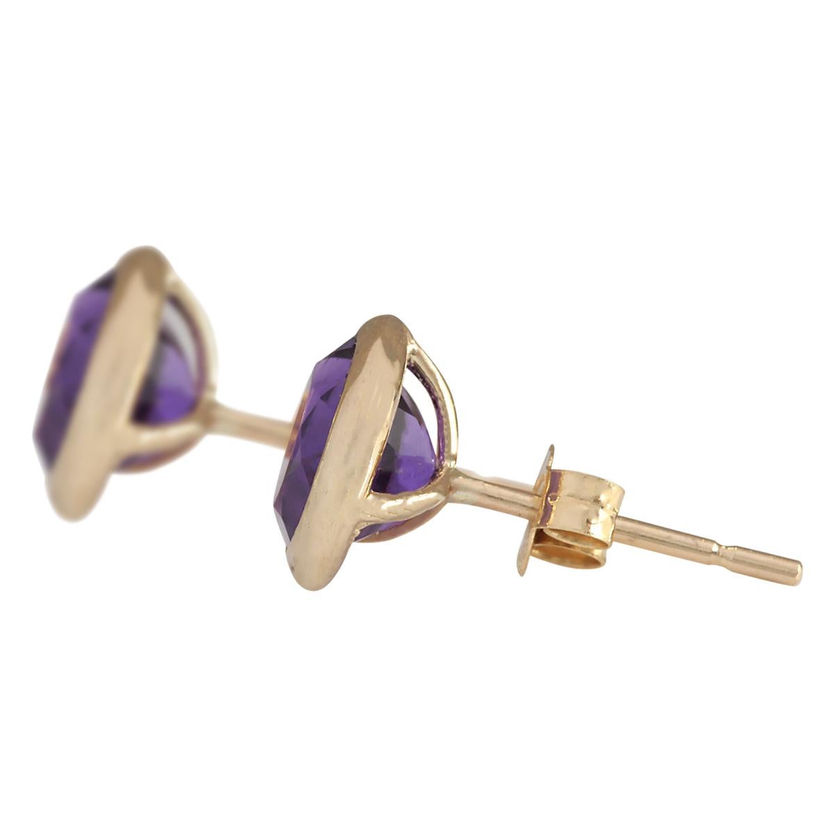 Stamped: 14K Yellow Gold
Total Earrings Weight: 1.8 Grams
 Total Natural Amethyst Weight is 3.00 Carat (Measures: 7.00x7.00 mm)
Color: Purple
Face Measures: 8.90x8.90 mm
Sku: [703314W]