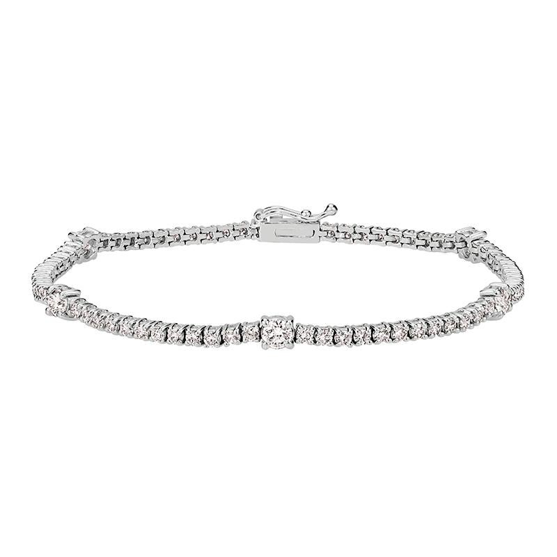 100% Natural Diamonds, Not Enhanced in any way Round Cut Diamond Bracelet 
3.00CT
G-H 
SI  
14K White Gold,  Prong Set,   6.8 gram
7 inches in length, 1/8 inch in width
5 diamonds - 0.83ct, 70 diamonds - 2.17ct

B5901-3IW
ALL OUR ITEMS ARE AVAILABLE