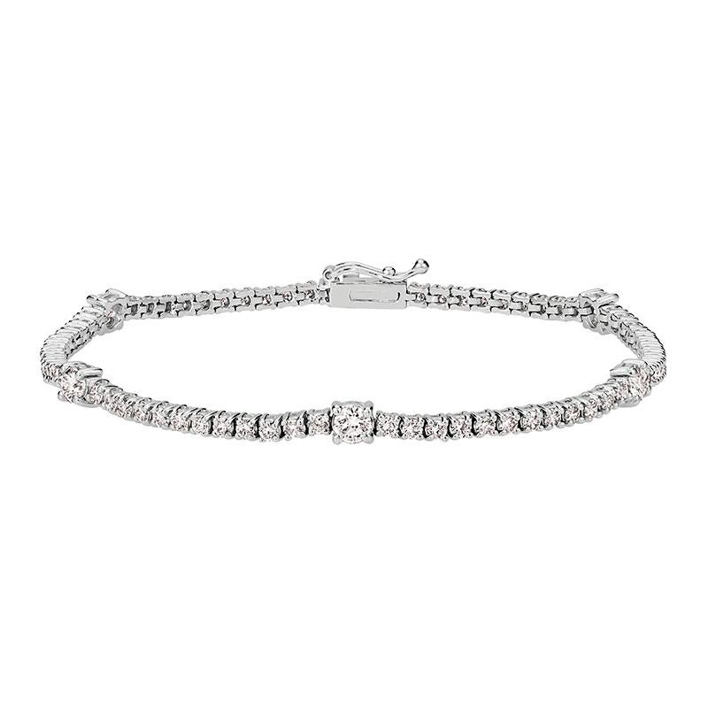 diamants 100% naturels, non rehaussés de quelque manière que ce soit Bracelet de diamants taille ronde 
3.00CT
G-H 
SI  
or blanc 14K,  Prong Set,   6.8 grammes
7 pouces de longueur, 1/8 pouce de largeur
5 diamants - 0,83ct, 70 diamants -