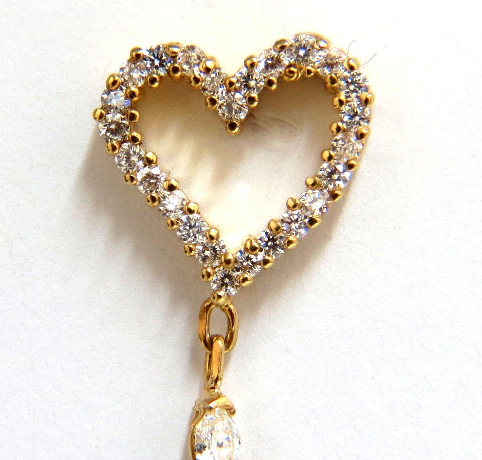 gold heart dangle earrings