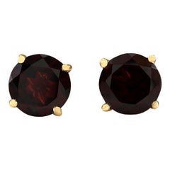 Granat-Ohrringe aus 14 Karat Gelbgold