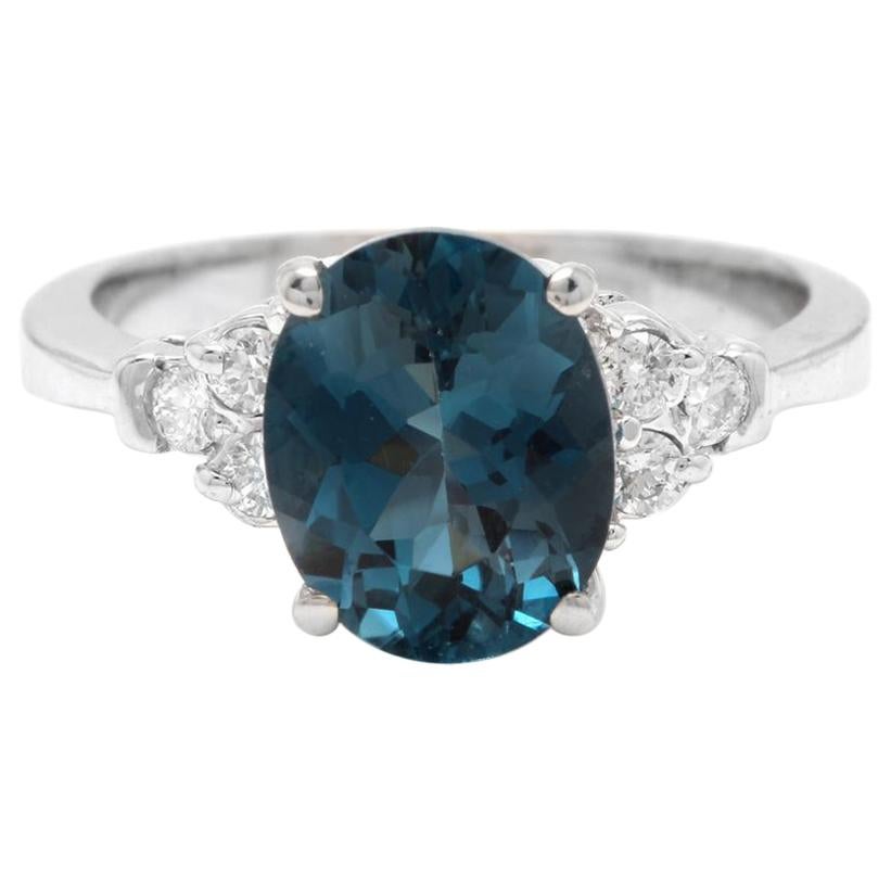 3.00 Carat Natural Impressive London Blue Topaz and Diamond 14k White Gold Ring For Sale