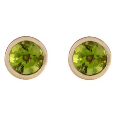 Peridot Earrings In 14 Karat Yellow Gold