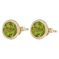 Peridot Earrings In 14 Karat Yellow Gold