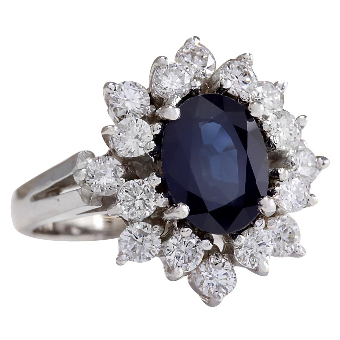 Stamped: 14K White Gold
Total Ring Weight: 5.0 Gram
 Total Natural Sapphire Weight is 2.00 Carat (Measures: 9.00x7.00 mm)
Color: Blue
Total Natural Diamond Weight is 1.00 Carat
Color: F-G, Clarity: VS2-SI1
Face Measures: 17.00x16.40 mm
Sku: [702895W]