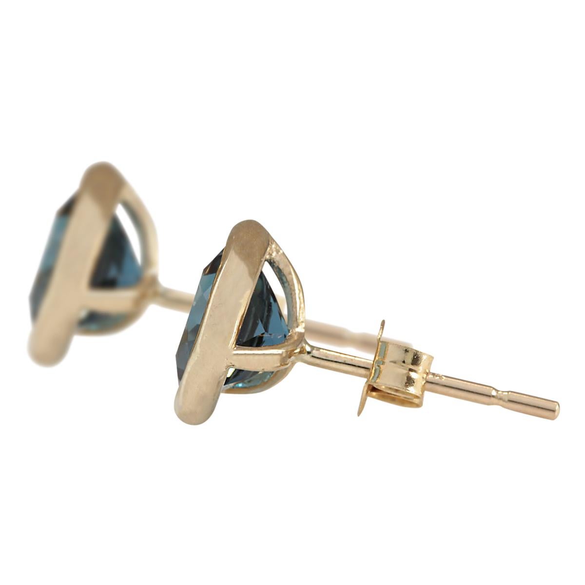 Stamped: 14K Yellow Gold
Total Earrings Weight: 1.8 Grams
Total Natural Topaz Weight is 3.00 Carat (Measures: 7.00x7.00 mm)
Color: London Blue
Face Measures: 8.80x8.80 mm
Sku: [703320W]