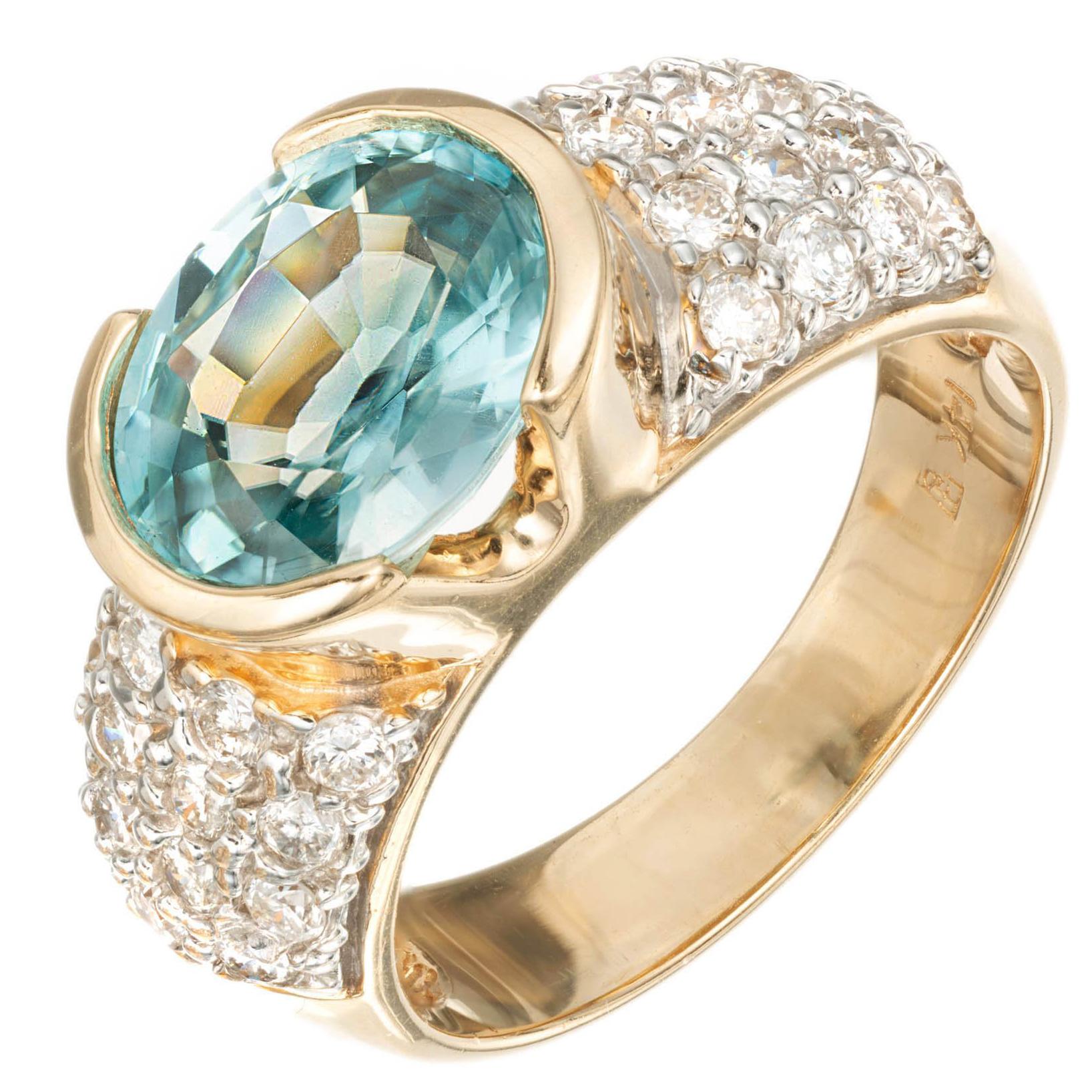 3,00 Karat ovaler blauer Zirkon-Diamant-Gelbgoldring im Angebot