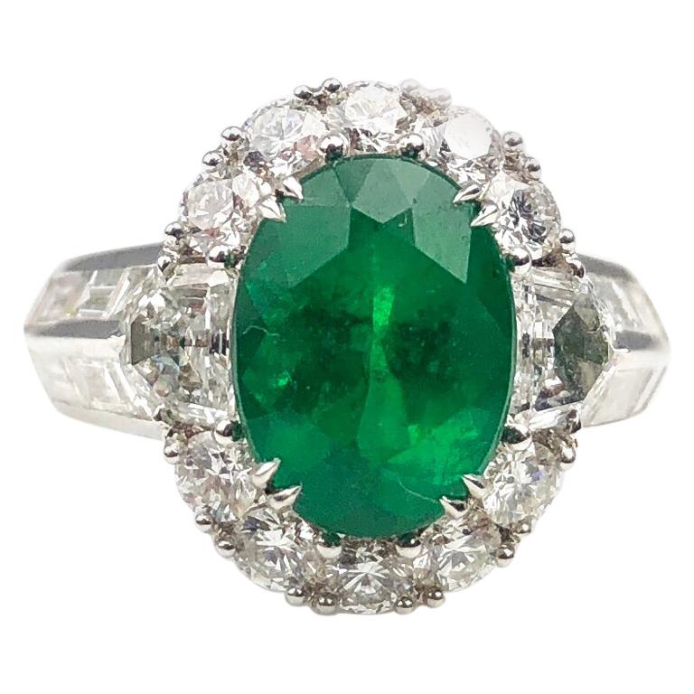3.00 Carat Oval Cut Colombian Emerald and 2.50 Carat Diamond Ring