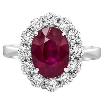 3-Carat Oval Cut Burmese Ruby and Diamond Halo Ring