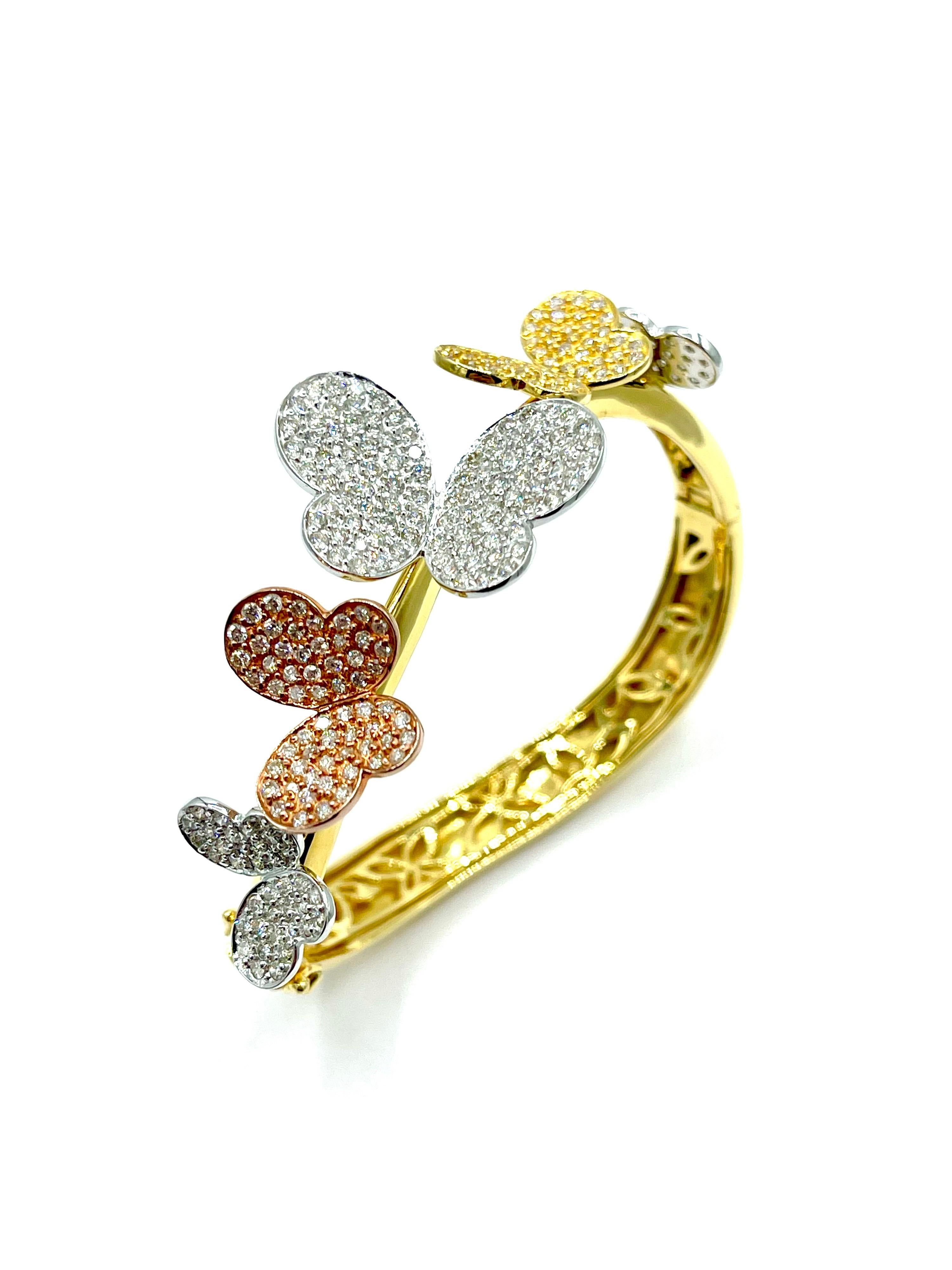 Such a whimsical bracelet to accessorize with!  The 3.00 carats in round brilliant Diamonds are pave set into five separate butterflies on the top half of the bracelet.  The butterflies are made in 18K white gold, rose gold, and yellow gold, with