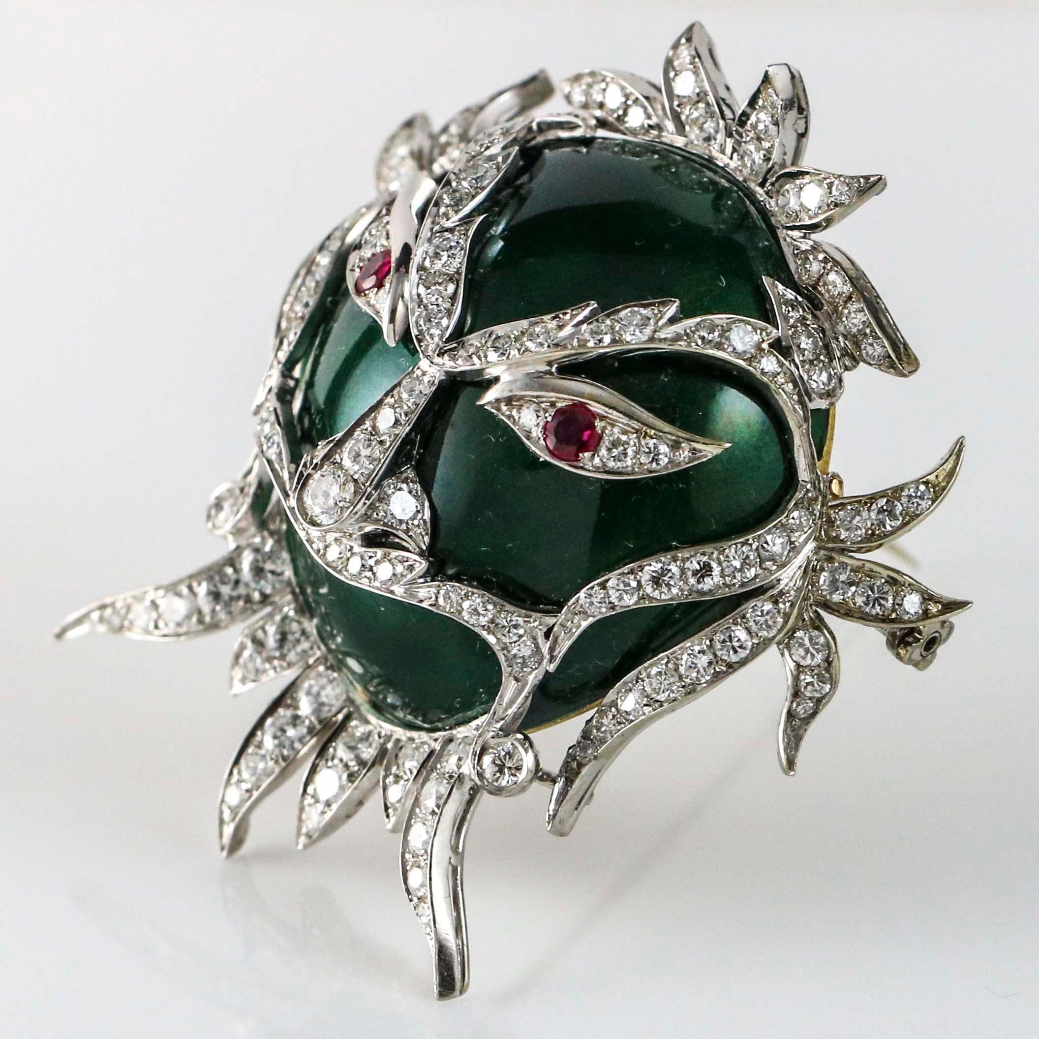 Native American 3.00 carat Ruby and Diamond 18k Gold Green Enamel Carnival Ornate Mask Brooch For Sale