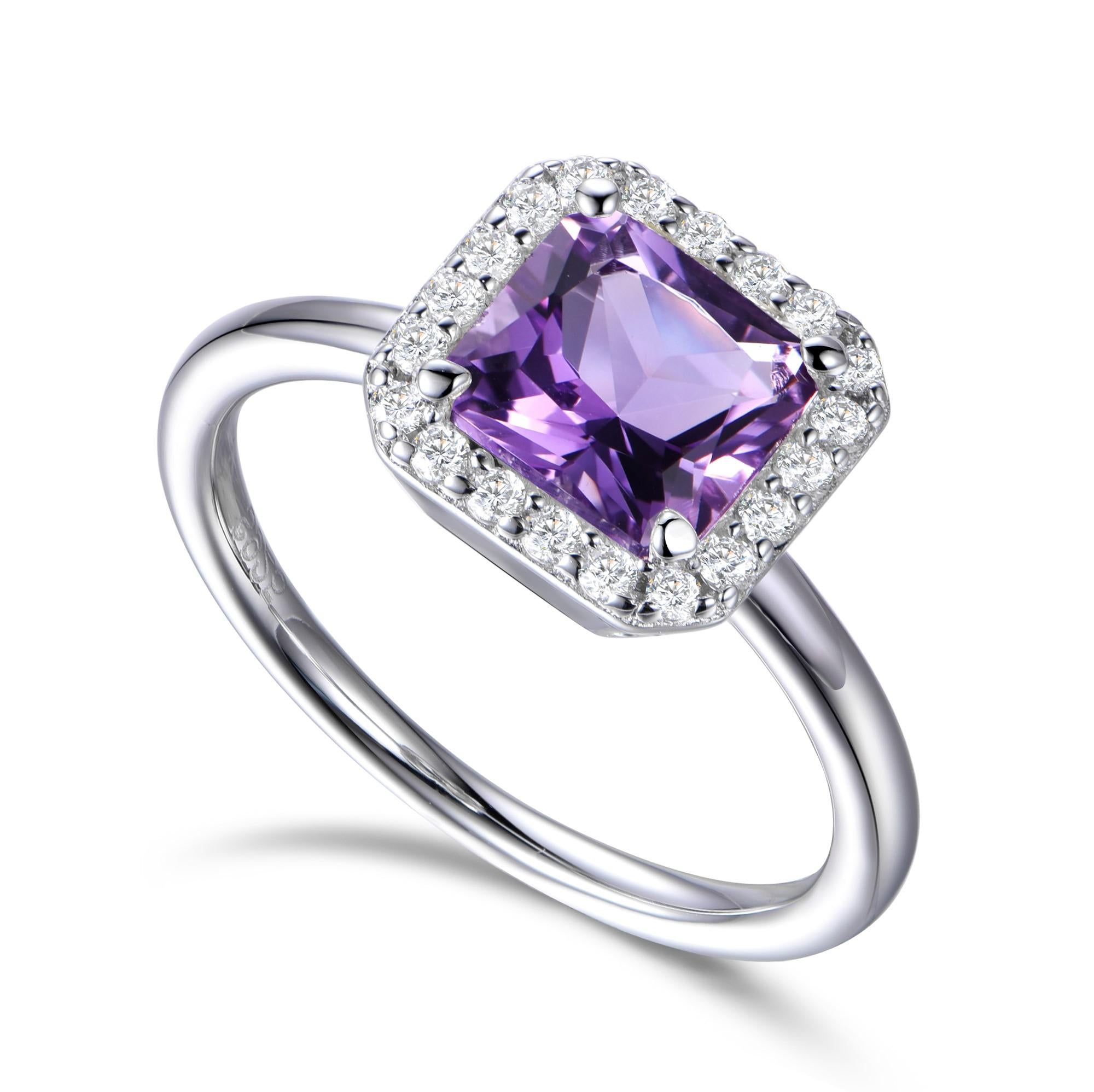 Smooth velvety tones emanate from this regal 3.00 carat purple Asscher cut cubic zirconia surrounded by a halo of 20 round brilliant cut cubic zirconia . 

Composed of 925 sterling silver with a high gloss white rhodium finish. 

Compliment with our