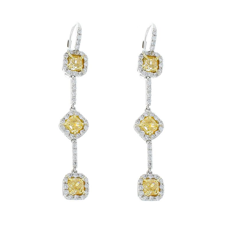 Contemporary 3.00 Carat Total Cushion Cut Fancy Yellow Diamond Dangle Earrings in Platinum