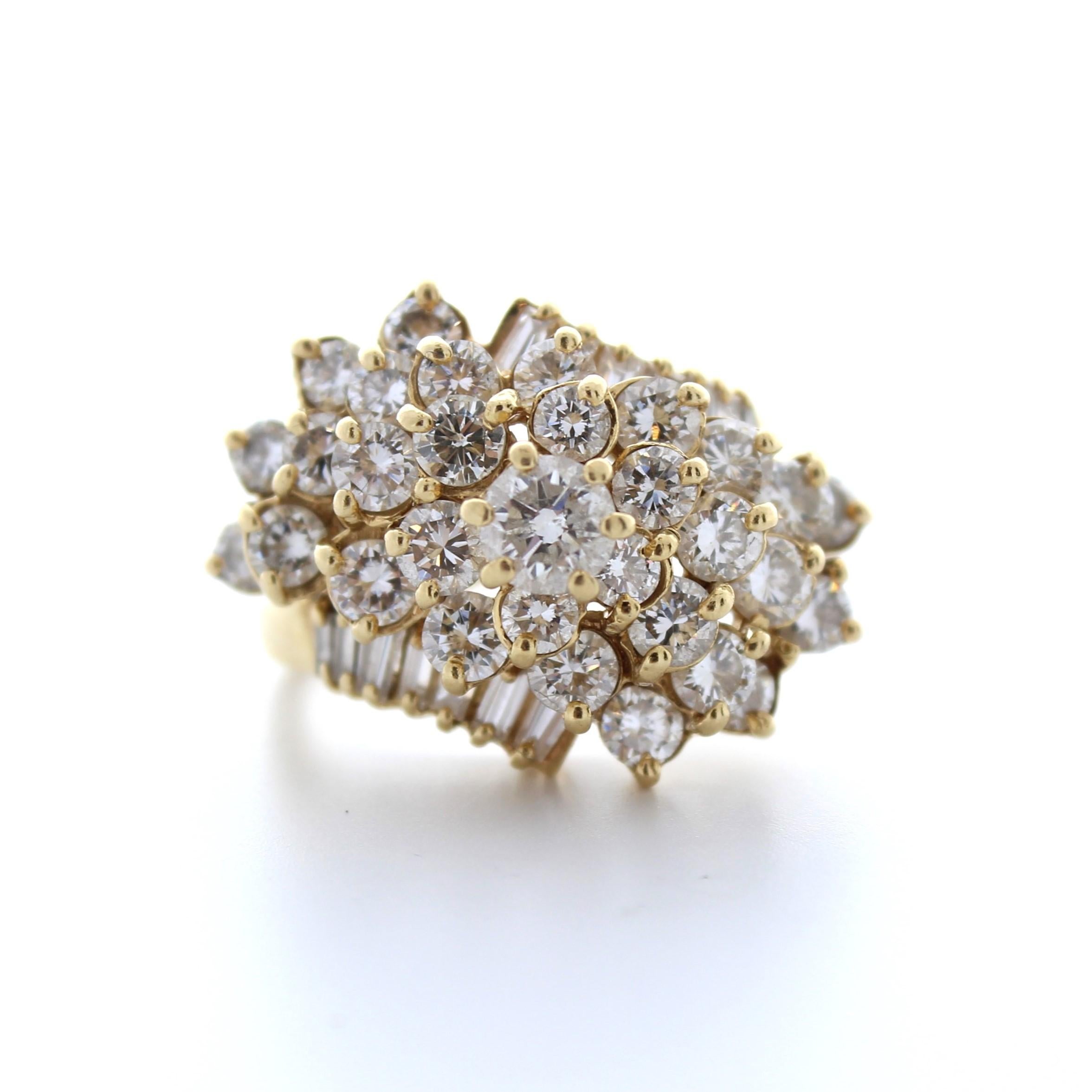 The 3.00 Carat Total Mixed Cut Diamond Ring in 14K Yellow Gold is a beautiful piece of jewelry that features a collection of mixed-cut diamonds set in a classic and elegant design. The ring is crafted from high-quality 14K yellow gold, which