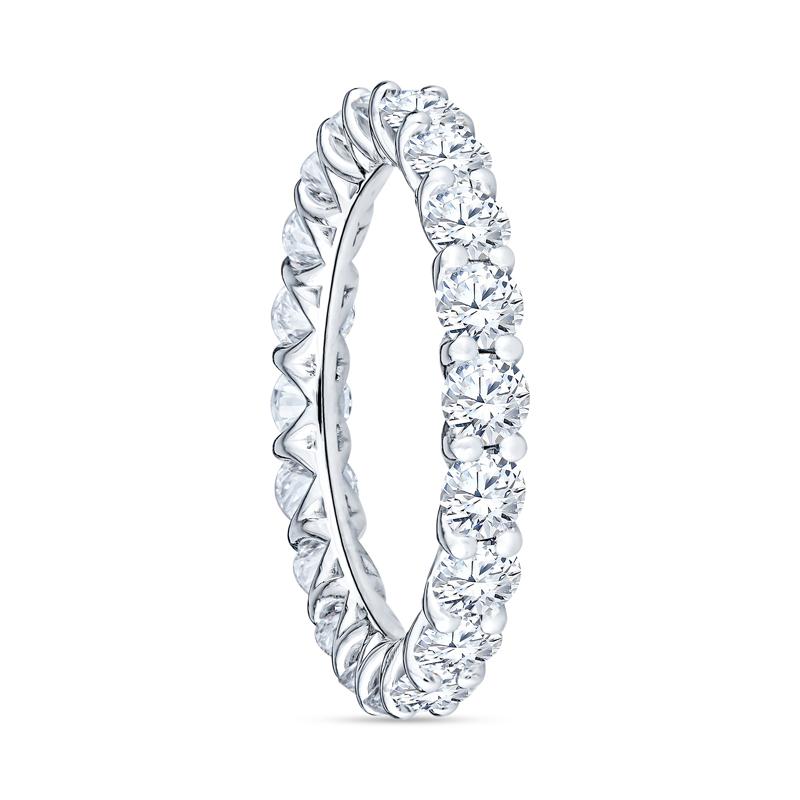 This eternity band features 3.00 carat total weight in round brilliant cut natural diamonds set in 14 karat white gold. It is a size 7. Please contact us for alternate sizing. 
Diamonds: G/H SI1