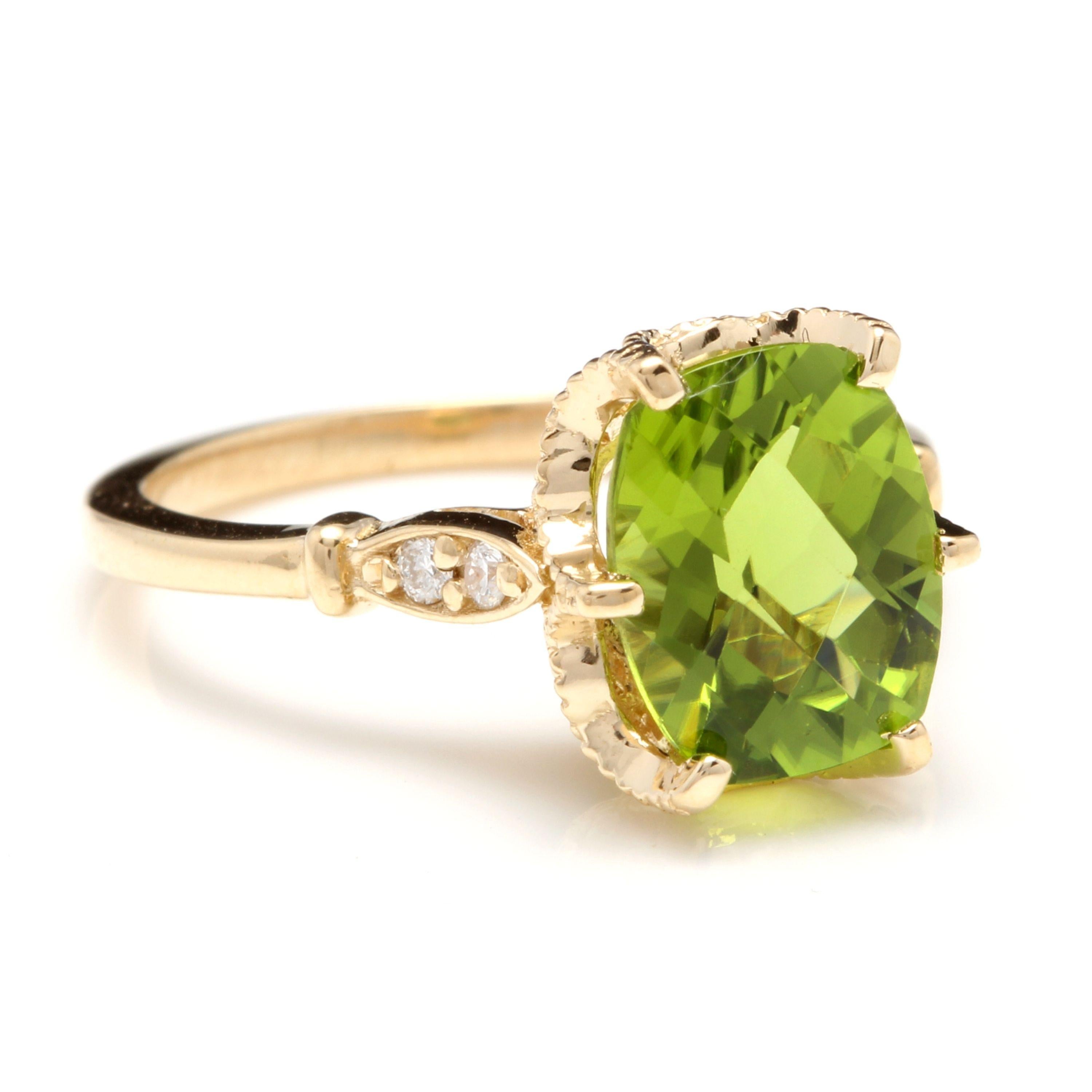 3.00 Carats Impressive Natural Peridot and Diamond 14K Yellow Gold Ring

Total Natural Peridot Weight is: Approx. 2.92 Carats

Peridot Measures: Approx. 10.00 x 8.00mm

Natural Round Diamonds Weight: Approx. 0.08 Carats (color G-H / Clarity