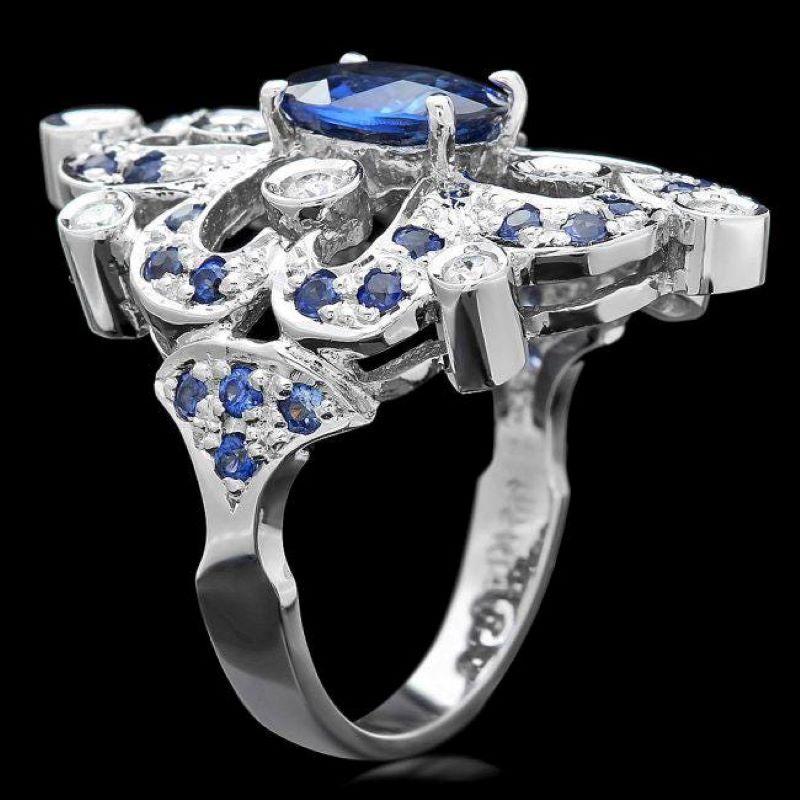 3.00 Carats Natural Blue Sapphire and Diamond 14K Solid White Gold Ring

Total Blue Sapphire Weight is: Approx. 2.70 Carats

Sapphire Measures: Approx. 9.00 x 7.00mm (1 oval)

Sapphire Measures: Approx. 1.5 mm (32 Round)

Sapphire treatment: