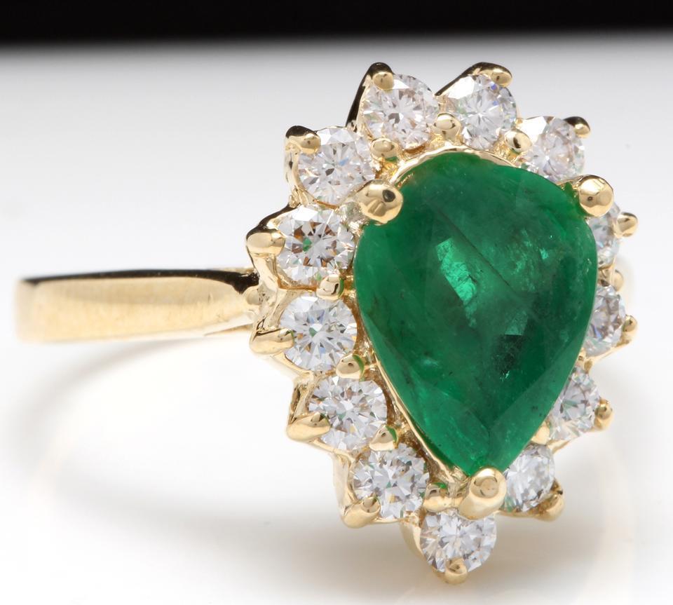 3.00 Carats Natural Emerald and Diamond 14K Solid Yellow Gold Ring

Total Natural Green Emerald Weight is: 2.25 Carats (transparent) (Oil/Resin Treated)

Emerald Measures: 9 x 7mm

Natural Round Diamonds Weight: .75 Carats (color G-H / Clarity
