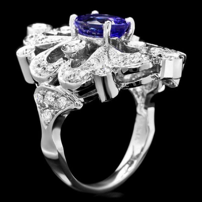 3.00 Carats Natural Tanzanite and Diamond 14K Solid White Gold Ring

Total Natural Tanzanite Weight is: Approx. 1.90 Carats 

Tanzanite Measures: Approx. 6.00 x 8.00mm

Natural Round Diamonds Weight: Approx. 1.10 Carats (color G-H / Clarity
