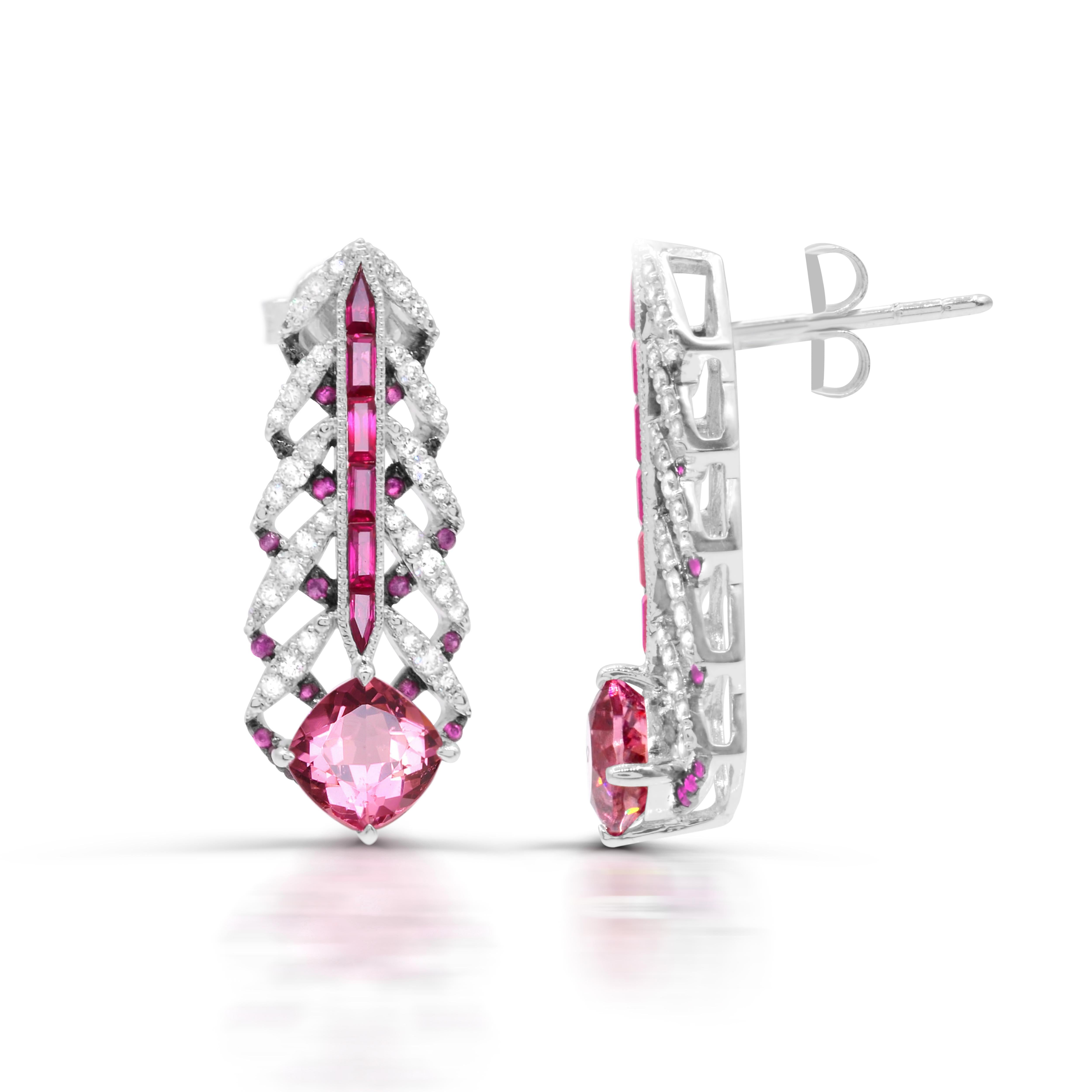 Exploring the red and pink hues for those lovers of statement treasures.  These earrings feature 6.00 mm Cushion Pink Tourmaline adorned with assorted baguette Rubies with Pink sapphires and 0.46 ct. t.w. sparkly brilliant-cut round diamonds to