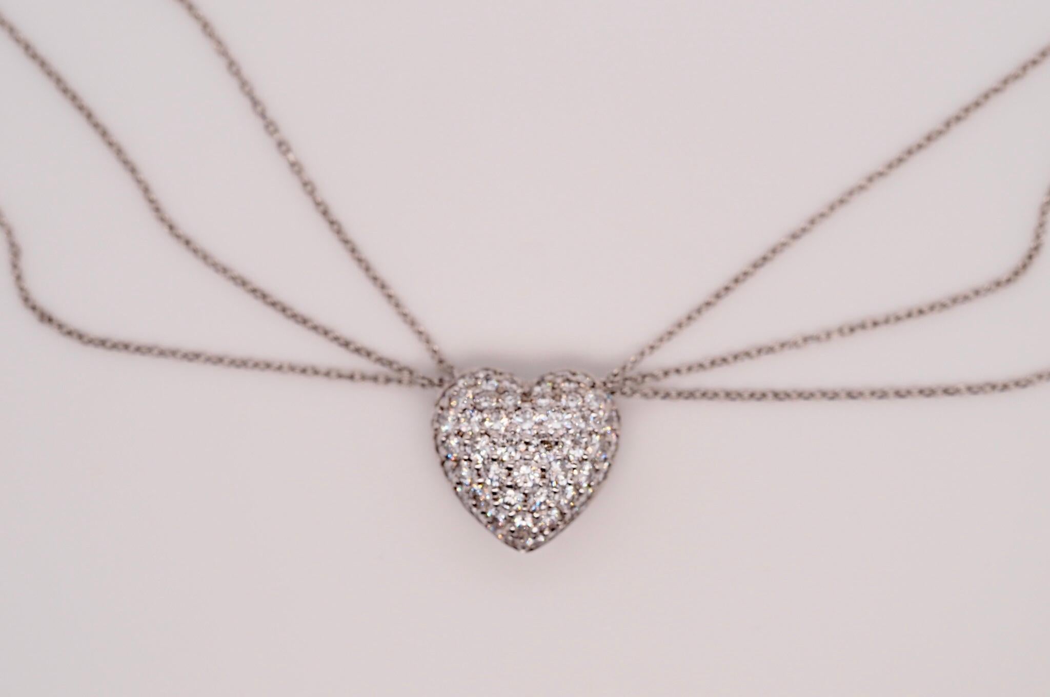 This Platinum Necklace includes 3.00 carats of round brilliant cut diamonds ranging from H-I color and SI1-SI2 Clarity. This piece has amazing brilliance that sparkles at every angle. The heart is set on multi 3-strand platinum necklaces.