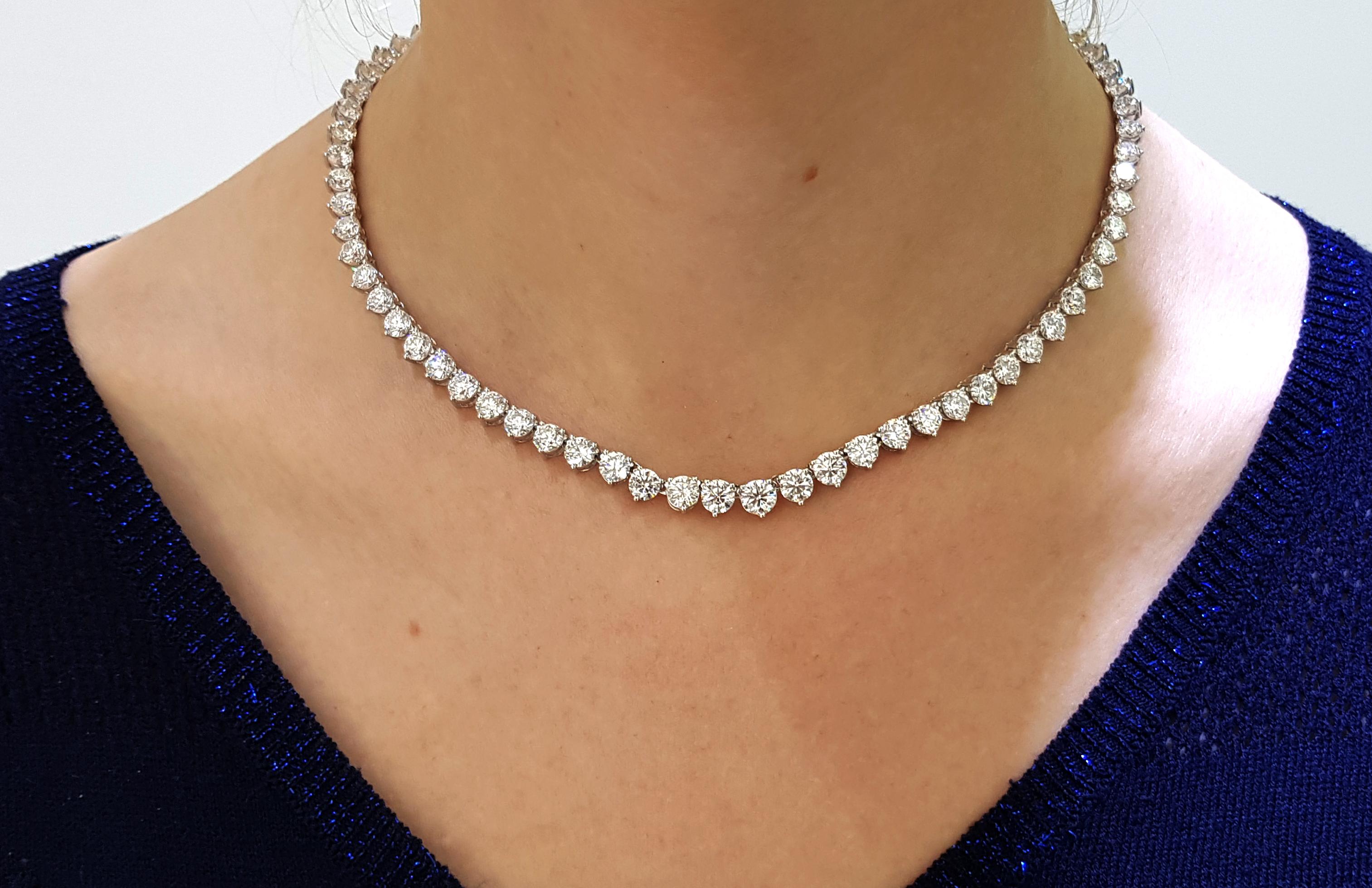 This stunning and impressive Riviera Necklace features substantial Diamond weight of 30.00 Carats in beautifully graduated Round Brilliant Cut gems with a sparkly white color G/H clarity SI1. Each stone has a three claw setting with open gallery and