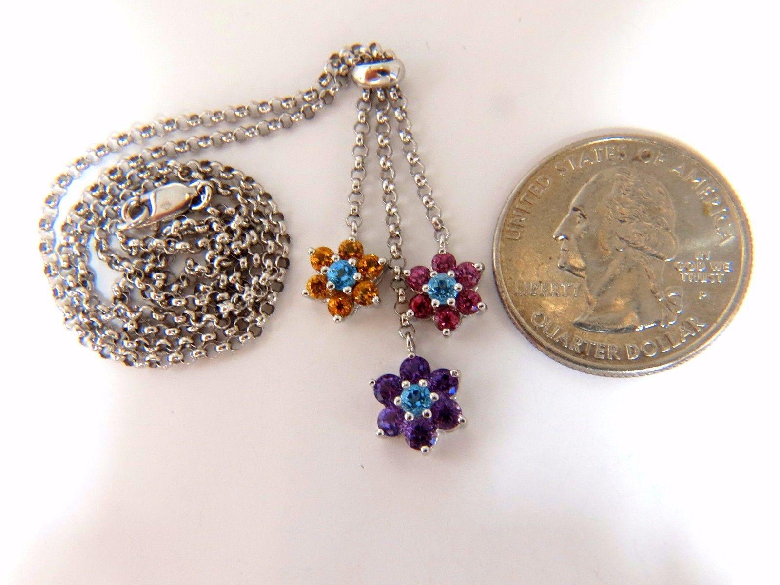 Three tier dangle bolo deco necklace.
Natural Amethyst, blue topaz, pink tourmalines & citrines clusters

All stones of Clean clarity & Transparent.

Full cut rounds.

Each stone: 2.8-3mm.

Full cut, brilliant

Each Cluster Overall Measurement: