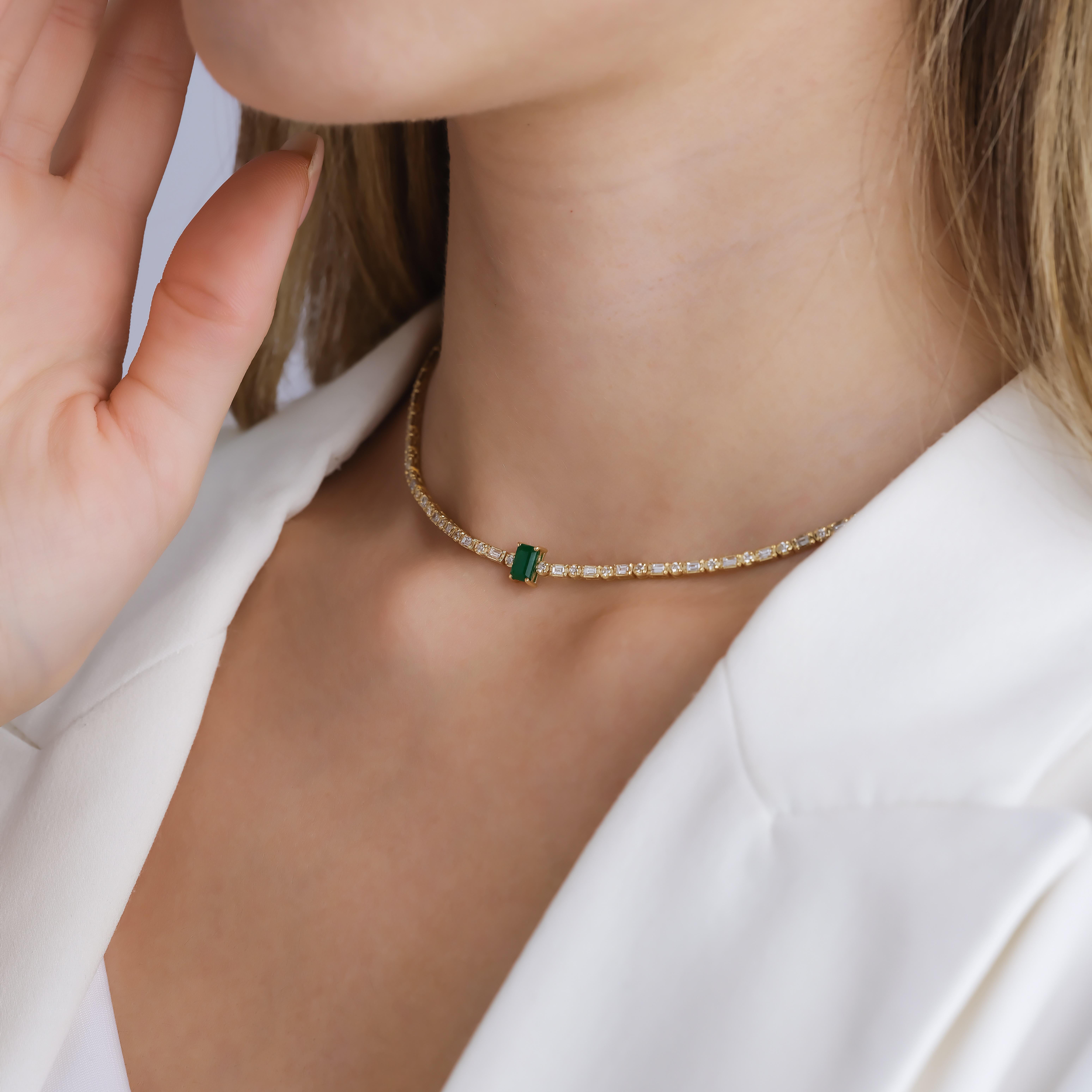 Exquisite in design and unmatched in brilliance, this necklace is a testament to timeless elegance. Crafted from solid 18kt gold, it gracefully showcases a series of breathtaking emeralds, each encapsulated by dazzling diamonds. The deep, verdant
